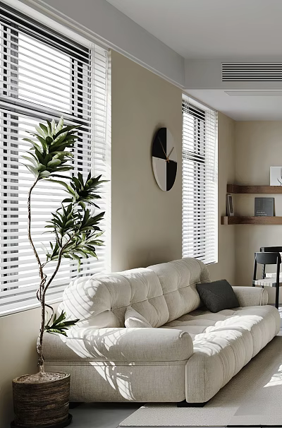 White Sectional Sofa In Living Room With Black Pillow Green Plant Clock And Window Blinds 3d model
