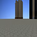 High Rise Residential Building With Modern Exterior And Multiple Windows Under Blue Sky