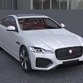 White Jaguar Sedan Modern Sporty Design With Red Interior Alloy Wheels And Front Grille
