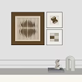 Abstract Decorative Paintings On Wall With Geometric Sculptures On White Shelf