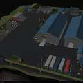 Industrial Factory Complex Featuring Multiple Blue Roof Buildings Parking Area Trucks And Greenery
