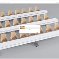 White Long Office Desks With Beige Chairs Neatly Arranged In Organized Layout