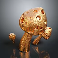 Three Decorative Golden Mushrooms with Textured Surface and Holes on Dark Background