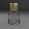 Modern Fragrance Bottle With Transparent Glass Body And Gold Cap Design