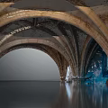 Ancient Vaulted Stone Arches Interior With Water Reflection And Blue Accents