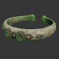 Textured Stone Like Decorative Bracelet With Carved Patterns And Bronze Round Accents