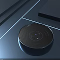 Round Wireless Speaker With Modern Design And Blue Lighting On Sleek Tabletop 3d model
