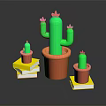 Green Cactus in Orange Pot with Smaller Cacti Placed on Yellow Books
