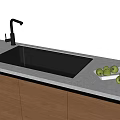 Kitchen Sink With Faucet Running Water Green Fruits On Light Colored Countertop Wooden Cabinets
