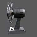 Vintage Electric Fan With Metal Circular Mesh Guard And Control Buttons On Base
