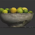 Fresh Limes and Lemons in Metal Colander Bowl on White Paper