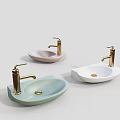 Three Modern Washbasins with Light Green Pink White Colors and Golden Faucets