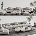Modern Gray Sofa with Multiple Cushions and Round Coffee Tables with Metal Bases and Ottoman