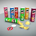 Pringles Snack Cans In Various Colors With Scattered Chips Lid And Speech Bubble Sticker