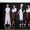 Women Posing Together In Different Styles Of Chef Uniforms And Aprons