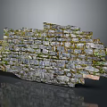 Natural Stacked Stone Wall With Green Moss And Rustic Textured Surface