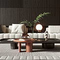 Black Coffee Table With Green Plant Decorative Figurine Books And Terracotta Side Table By Sofa