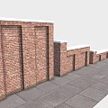 Outdoor Red Brick Wall Structures With Varying Heights And Gray Stone Pavement
