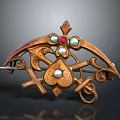 Vintage Golden Metal Brooch With Central Ruby Pearl Accents Heart Cross And Scrollwork Design