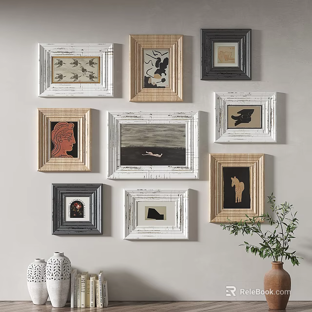 Living Room Wall With Assorted Framed Art Decorations 3d model
