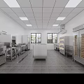 Commercial Kitchen With Stainless Steel Equipment White Walls Ceiling Lights Windows And Central Workbench