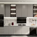 Modern Kitchen With White And Brown Glass Door Cabinets Marble Countertop And Appliances