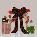 Black Red Floral Bow With Red Pink Flowers Gold Stems Pink Candles Green Gift Box