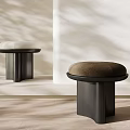 Minimalist Round Stools With Black Metal Bases And Brown White Cushioned Seats