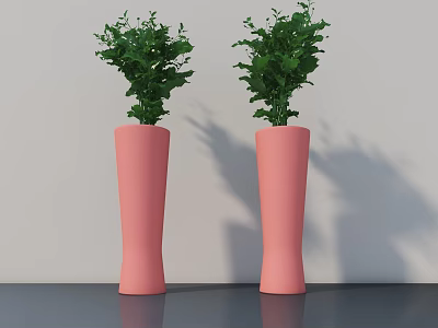Decorative Pink Vases with Green Plants on Grey Tabletop Against Light Wall 3d model