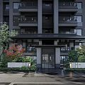 Modern Building Entrance Design With Glass Doors Green Plants Outdoor Lighting And Dark Facade