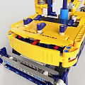 Electric Construction Toy Built From Building Blocks With Mechanical Arm And Wheels 3d model