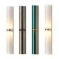 Modern Cylindrical Wall Sconces in White Brown Green on Dark Wall Illuminated