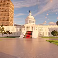 United States Capitol White Building Dome Plaza With Trees Blue Sky And White Clouds