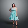 Little Girl in Light Blue Polka Dot Dress with Floral Hair Accessory on Grey Background