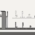 Various Modern Faucet Models With Large Black Faucet Displayed On White Countertop In Showroom