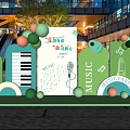 Green Music Themed Installation With Piano Keyboard Microphone Notes And Balloons In Mall Atrium