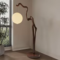 Natural Branch Shaped Floor Lamp With White Round Lampshade And Potted Plant Near Window