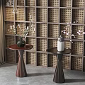 Modern Side Tables With Conical Base Dark Brown Black Vases Flowers Woven Lattice Wall