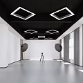 Spacious Photography Studio Interior With Black Square Ceiling Lights White Walls And Gray Floor