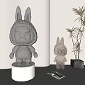 Shiny Metallic Rabbit Shaped Sculptures Large And Small On White Display Stands