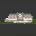 Historic Classical Building Complex With Courtyard Multiple Roofs And Green Lawn