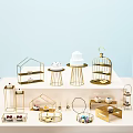 Elegant Golden Metal Stands With Various Shapes Displaying Delicious Cakes And Desserts
