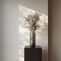 Sleek Metallic Vase With Olive Branches On Dark Wood Cabinet And Sunlight Striped Shadows