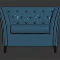 Blue Tufted Single Sofa With Studded Edges And Elegant Modern Upholstered Design