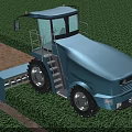 Blue Agricultural Farm Equipment With Cabin And Tilling Attachment Working On Green Grassland Field