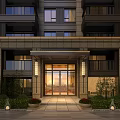 Modern High Rise Building Entrance Gate With Glass Doors Stone Accents Greenery And Lamp Posts