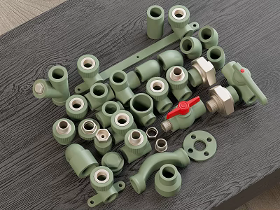 Green Plumbing Fittings Including Valves Connectors And Elbows On Gray Surface 3d model