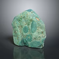 Natural Wood Stone Material With Green Color And Round Spots Rough Surface Texture