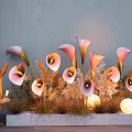 Elegant Floral Display With Pink Calla Lilies Rabbit Figurine Decorative Grass And Glowing Orbs