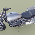 Vintage Black Motorcycle With Spoke Wheels Headlight Exposed Engine And Leather Saddlebag
